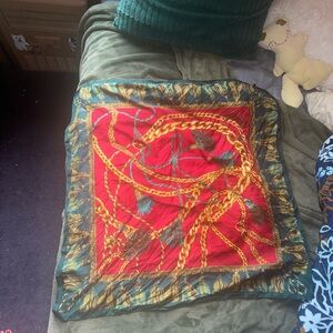 Vibrant Red and Green Scarf with Gold Chain Design